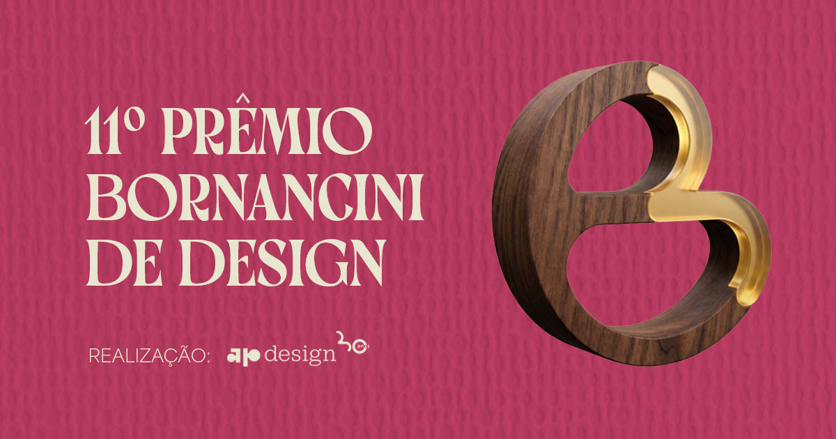 Troféu do Prêmio Bornancini, um B de madeira com friso dourado, sobre fundo rosa, ao lado do título 11º Prêmio Bornancini de Design