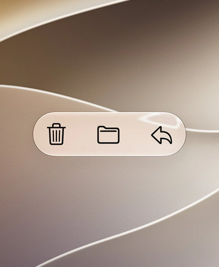 Botões Apagar, Mover e Responder do app Mail em Liquid Glass tingido sobre fundo ondulado dourado, com ícones escuros de alto contraste